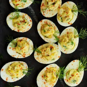 This tuna deviled eggs recipe combines tuna with mayonnaise, Dijon mustard, horseradish, green onion, eggs, and dill to make a deliciously fun appetizer!