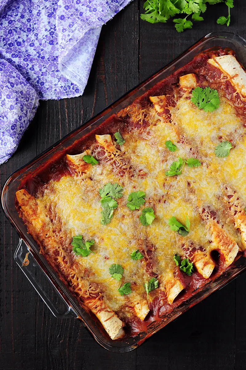 Looking for a street-smart way to use up leftover turkey or an exciting dish to spice up a weeknight? These healthy turkey enchiladas fit the bill just fine.