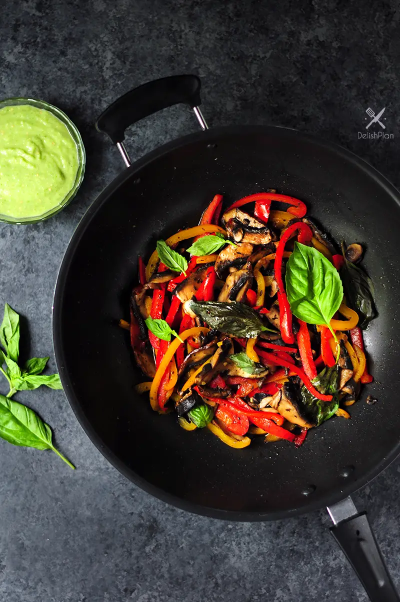 20-minute vegetarian tacos with bell peppers and portobello mushrooms cooked in a savory citrus sauce. It's a great meatless meal for your weekly meal plan.
