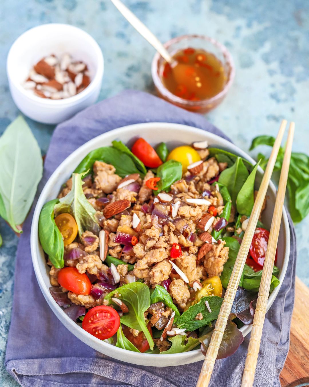 A bright, 25-minute Zesty Chicken Larb Salad with lime-fish sauce dressing, fresh herbs, and toasted almonds.
