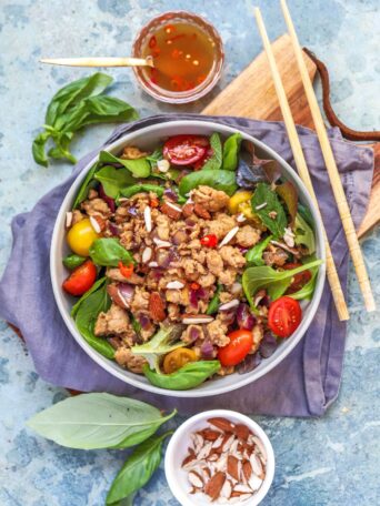 A bright, 25-minute Zesty Chicken Larb Salad with lime-fish sauce dressing, fresh herbs, and toasted almonds.