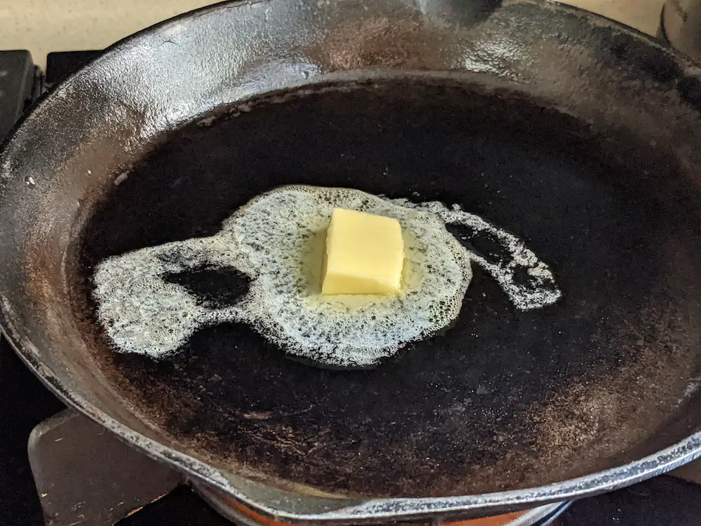 butter in hot skillet