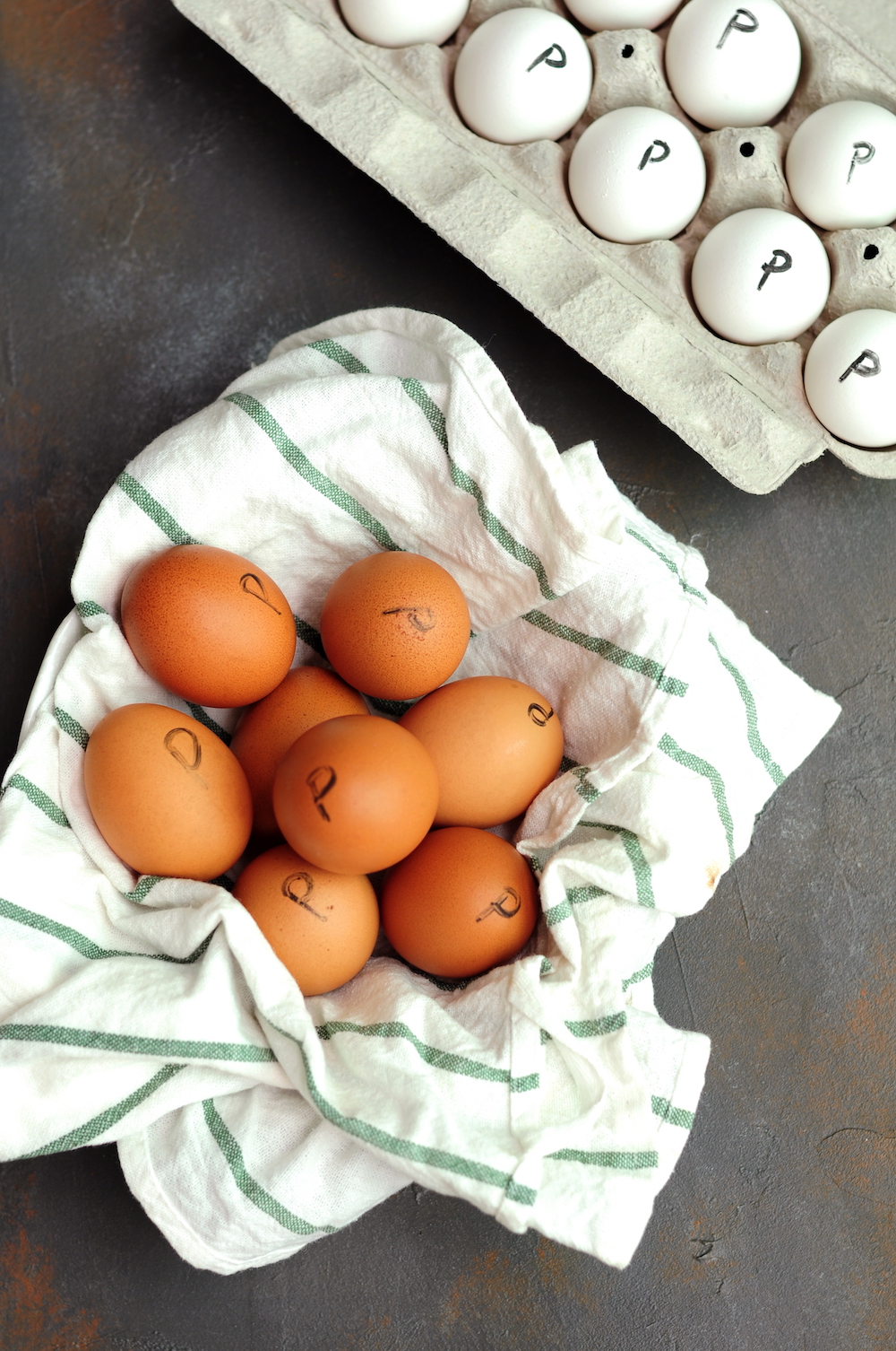 Marked pasteurized eggs sous vide in their shells