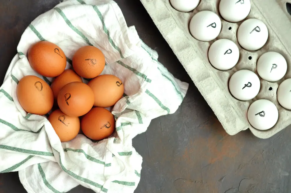 Pasteurized eggs sous vide with "P" marked on the shells